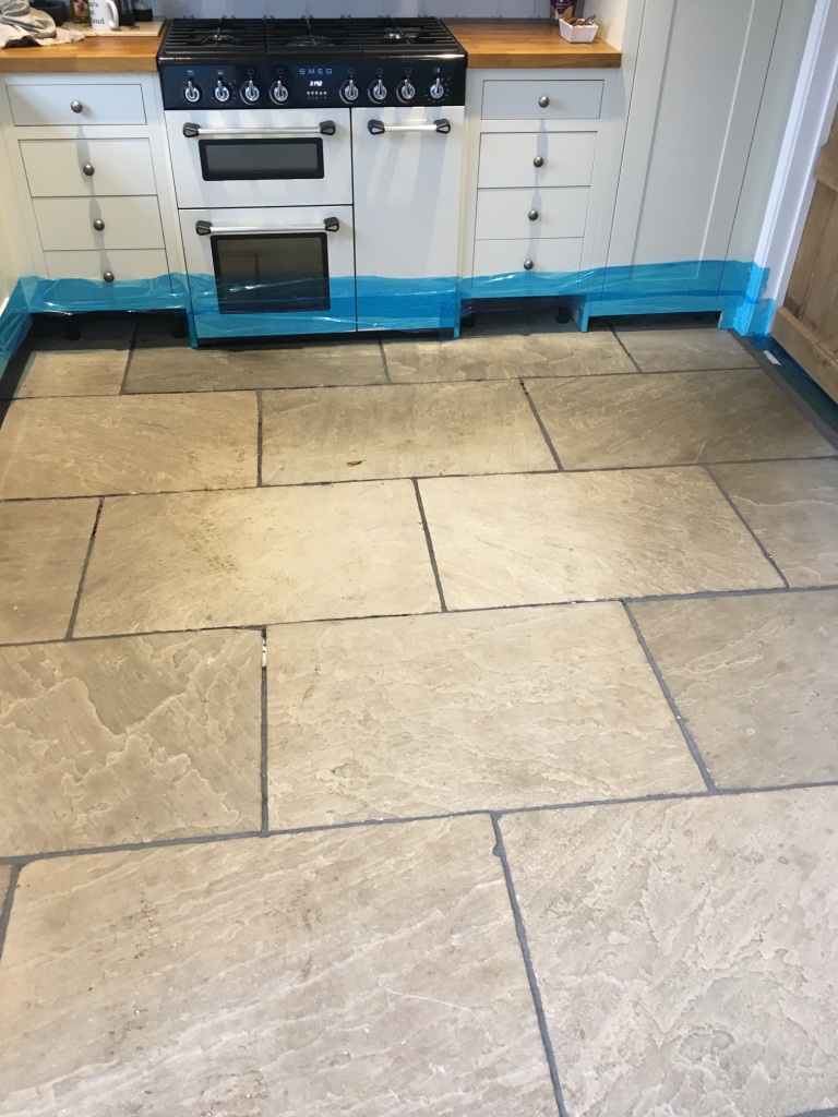 Flagstone floor before restoration Vines Cross