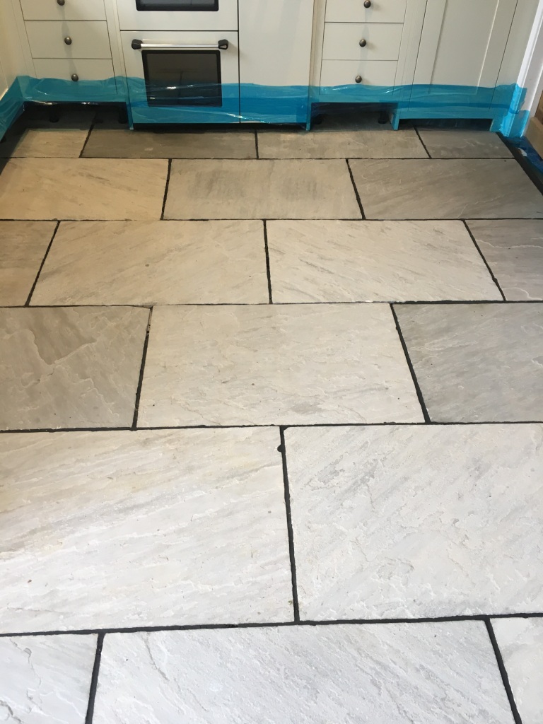 Flagstone floor during restoration Vines Cross