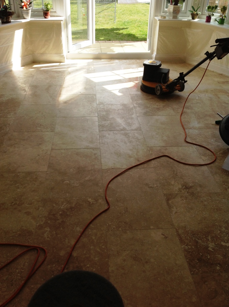 Travertine floor during honing and polishing Polegate